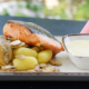 Salmon with cheese sauce and roasted mushrooms